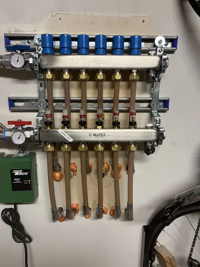 Plumber performing Water Heater Repair at a residential property in San Carlos